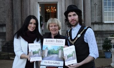 Lord Mayor of Armagh Garath Keating is joined by Cllr Sharon Haughey Grimley and local author Anne Gallogly to launch Anne's new book on dementia at The Palace Armagh