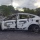 Burnt out car on Dundrum Road, Tassagh