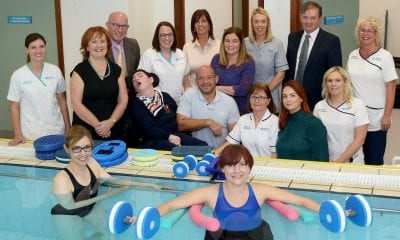 Special guests Patient, Odhran Smyth and Rory Best, OBE, Irish Rugby Union player and captain of Ireland's International team with Odhran’s mother Patrice; Non Executive Director John Wilkinson; Melanie McClements, Interim Director of Older People and Primary Care; Brian Beattie, Assistant Director of Primary Care; Teresa Ross, Head of Physiotherapy and Physiotherapy staff.