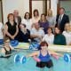 Special guests Patient, Odhran Smyth and Rory Best, OBE, Irish Rugby Union player and captain of Ireland's International team with Odhran’s mother Patrice; Non Executive Director John Wilkinson; Melanie McClements, Interim Director of Older People and Primary Care; Brian Beattie, Assistant Director of Primary Care; Teresa Ross, Head of Physiotherapy and Physiotherapy staff.