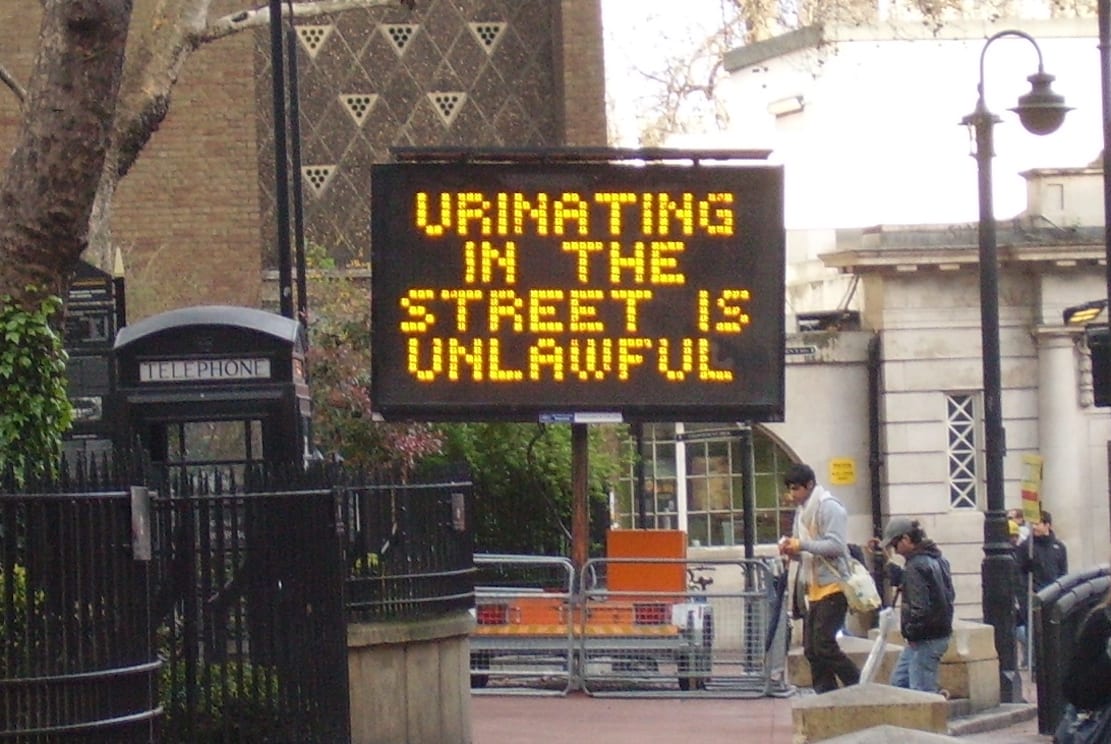 Urinating in street