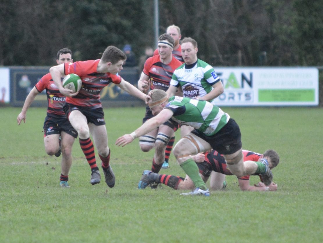 Shea O’Brien spins away from the Naas Defence