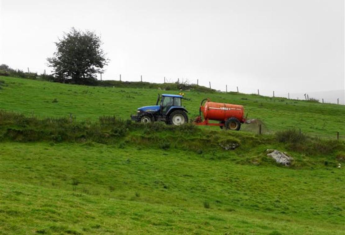 Tractor slurry spreading in northern Ireland