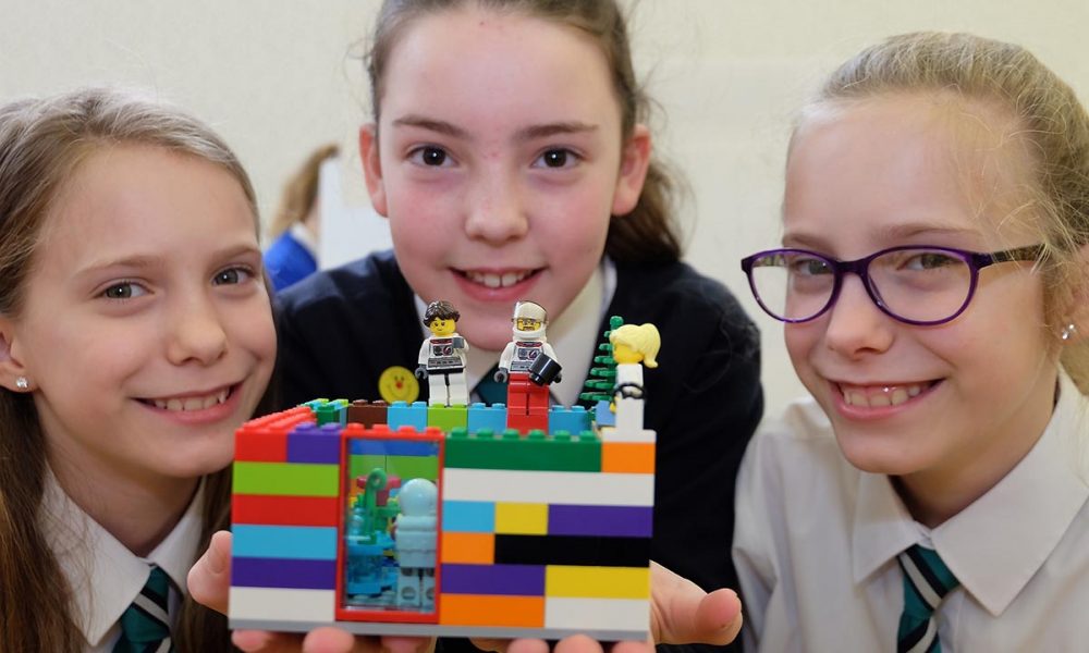 From left: Drumhillery Primary School students Wictoria Gleinart, Eva Robinson and Nicola Gleinart show off their Lego creation. The Lego Mindstorm project brings children and teachers from primary schools together for Lego Mindstorm Workshops and subsequently for Space Challenge Competitions and Exhibitions of Project work and Project Sharing ideas. Peace by PIECE Lego Mindstorm funded by Peace IV co-ordinated by CMETB Tommy Makem Centre Keady Co.Armagh 9 3 2019 CREDIT: LiamMcArdle.com