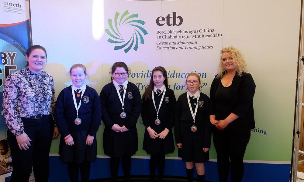 St Mary's Primary School Students receive their medals from Laura Brady Project Co ordinator CMETB