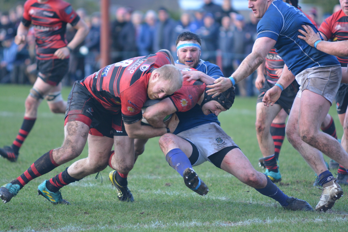 Neil faloon Pods with James Morton in an effort to break the St. Mary’s defence in the second half