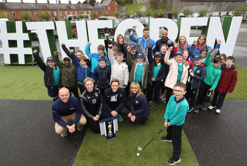 ‘The Epic Journey to The 148th Open’ The Epic Journey to The 148th Open Swings into Armagh – Local Armagh schools, golf clubs, tourism industry representatives and sports stars joined together at The Shambles Yard to celebrate Tourism NI’s community engagement campaign ‘The Epic Journey to The 148th Open’. The community event is visiting every county in NI to mark the excitement and civic pride surrounding The Open Championship’s return to Royal Portrush this July. 