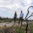 Minister Edwin Poots is pictured with Heather McLachlan, National Trust Director NI, at the site of the wildfire in the Mournes