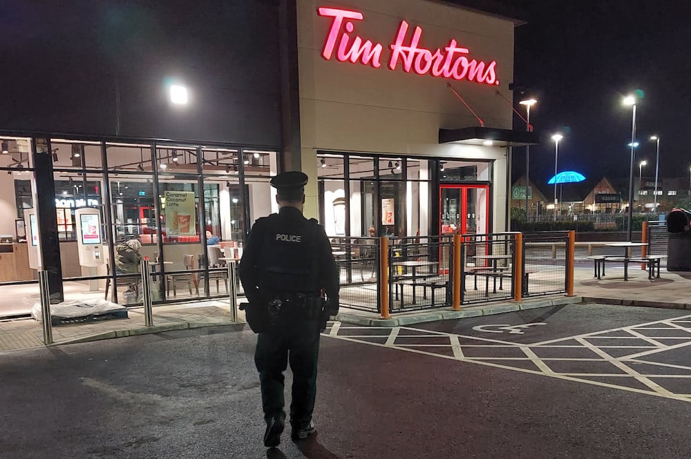 Police officer outside Tim Horton's Portadown