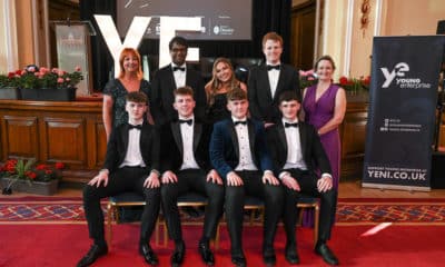 Young Enterprise Southern Company of the Year 2023, Enlighten, with (back left) Judith Totten, Chair, Young Enterprise and Paul Narain, US Consul General in Belfast; and (back right) Joe Kennedy III, US Special Envoy to Northern Ireland for Economic Affair; and Carol Fitzsimons MBE, CEO, Young Enterprise.