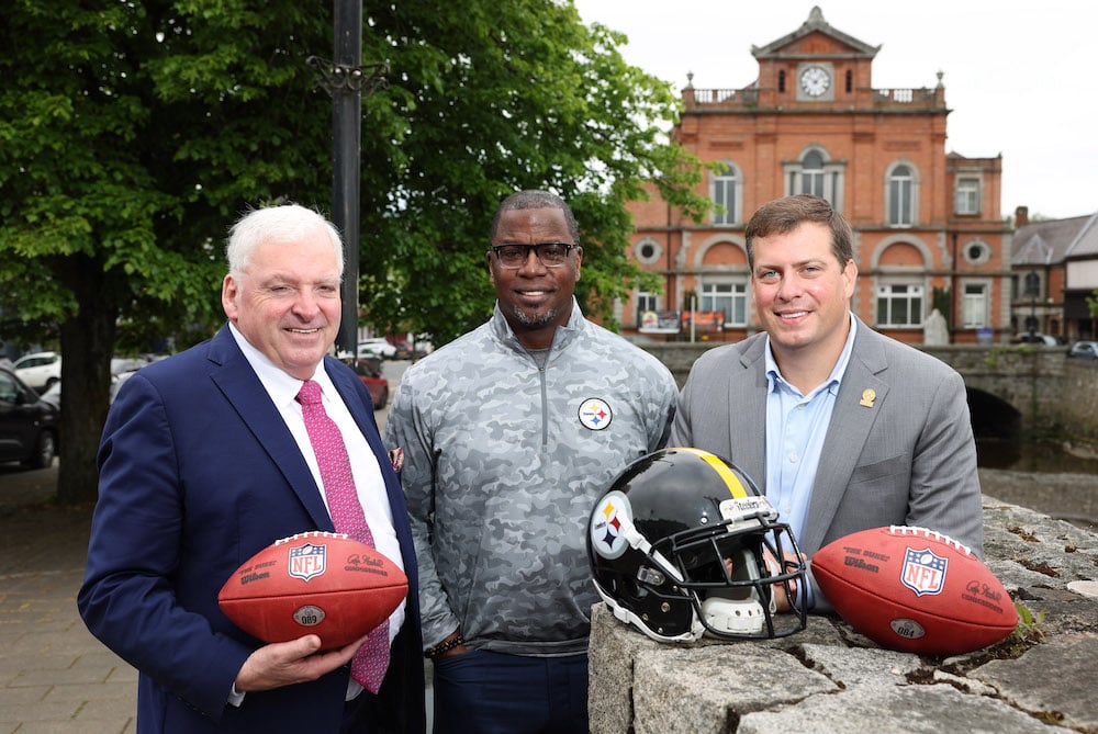 Pictured at Newry Town Hall are Daniel Rooney, Director of Business of Development & Strategy at Pittsburgh Steelers, former Pittsburgh Steelers quarterback Kordell Stewart and Fergal McCormack, Managing Partner of PKF – FPM Accountants and Rooney family friend.