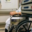 woman in wheelchair in hospital