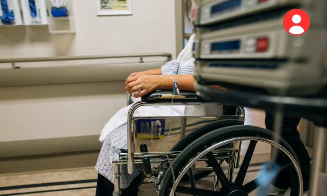 woman in wheelchair in hospital